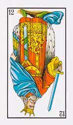 Carta invertida del rey de espadas
